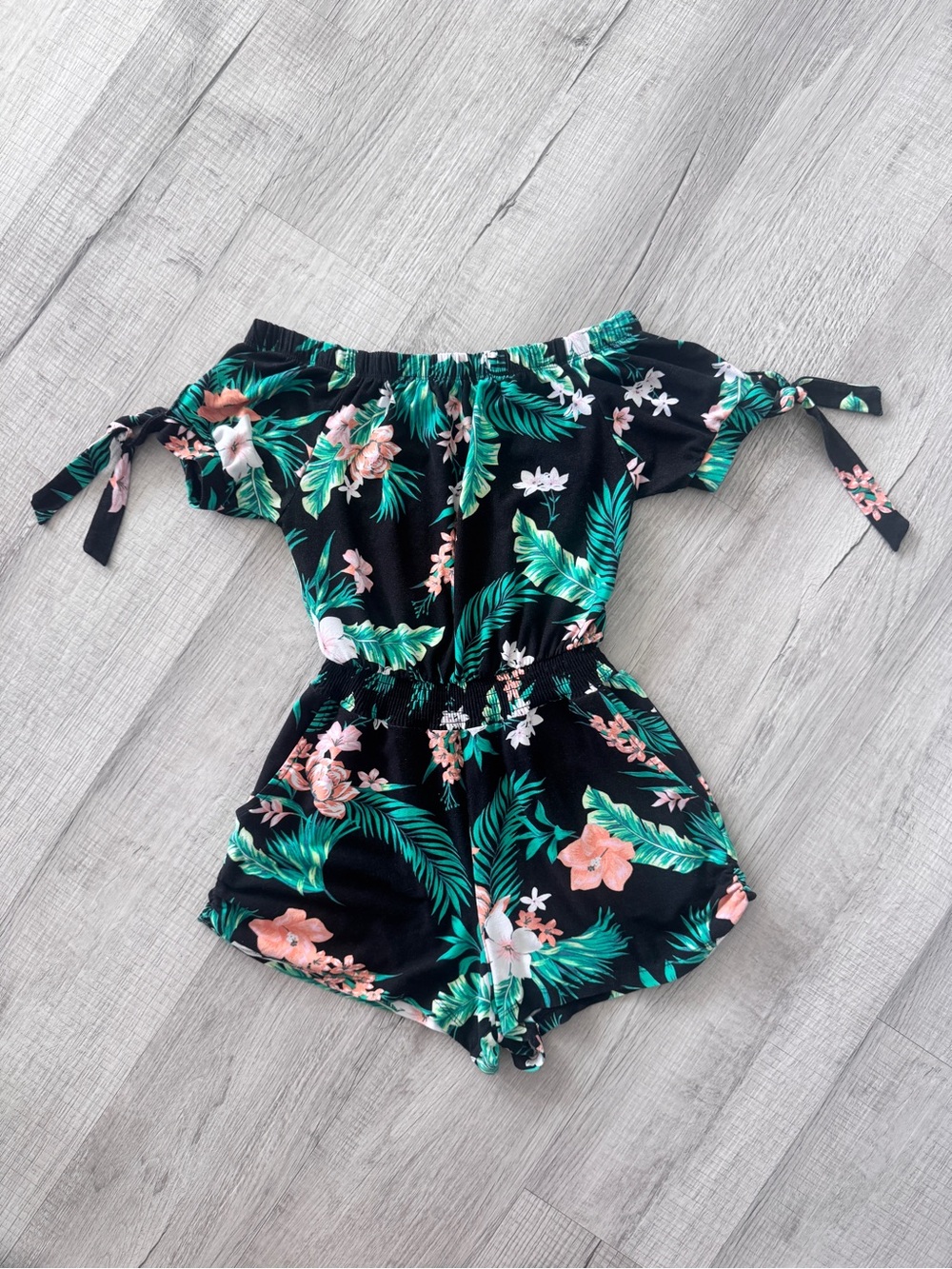 Derek Heart Black Floral Off-Shoulder Romper with Green Leaf Print